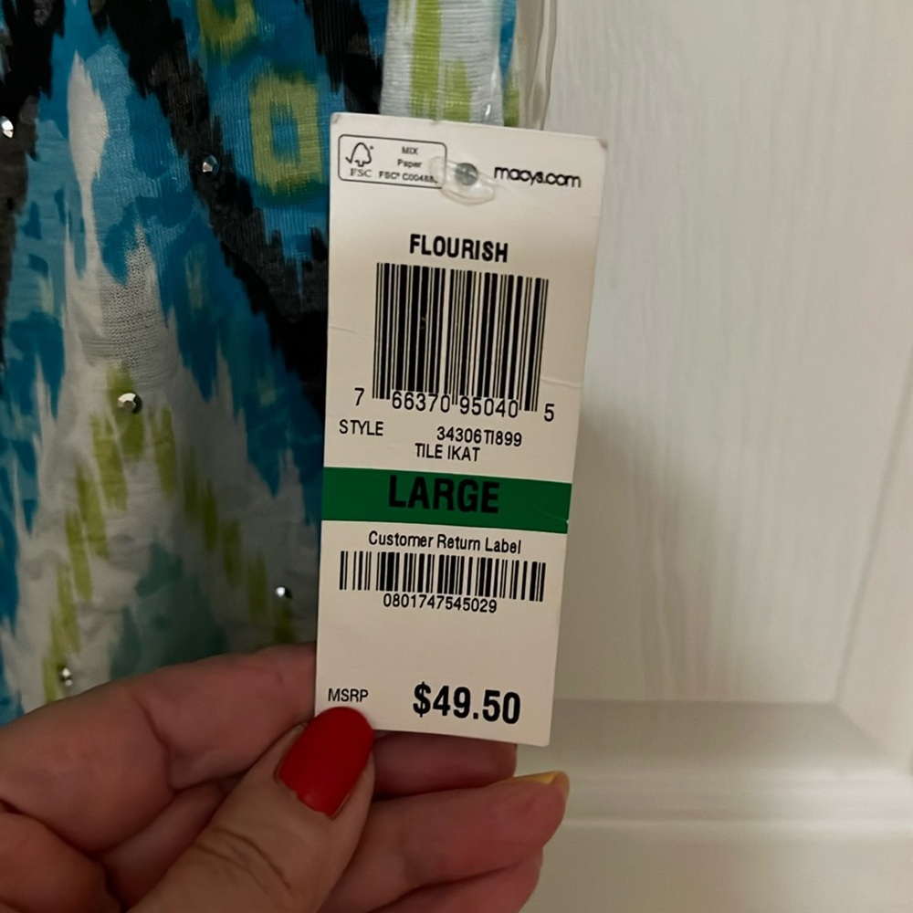 Sleeveless nwt multicolored top.